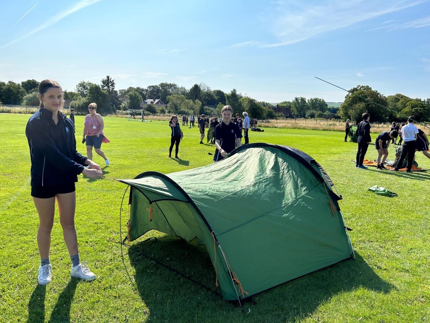 Students pitch tents on a D of E expedition
