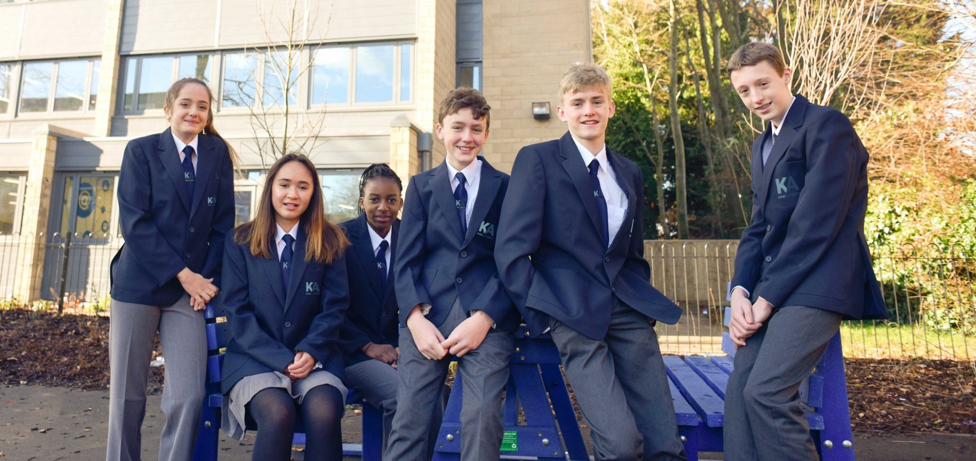 Students wearing the uniform.